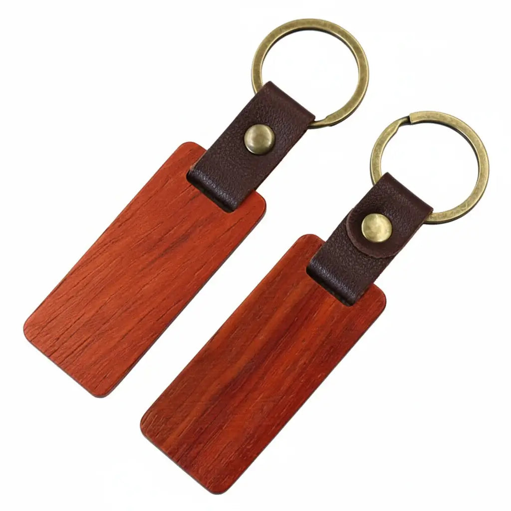 Custom engraved wooden keychain with PU leather strap and copper ring on white background — view 4