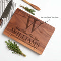 Custom engraved wooden cutting board made of dark walnut wood with personalized text design