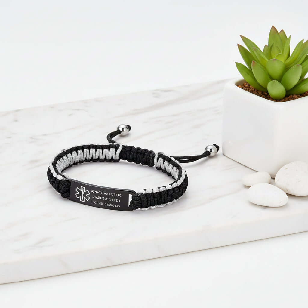 Custom engraved braided bracelet with black stainless steel curved plate and woven rope band — view 2