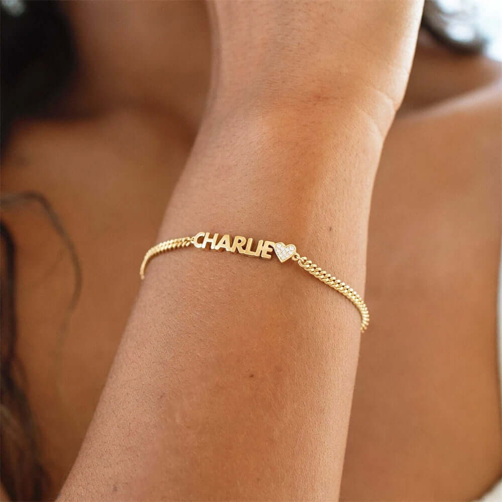 Custom engraved name bracelet in polished stainless steel displayed as an elegant personalized jewelry piece — view 5