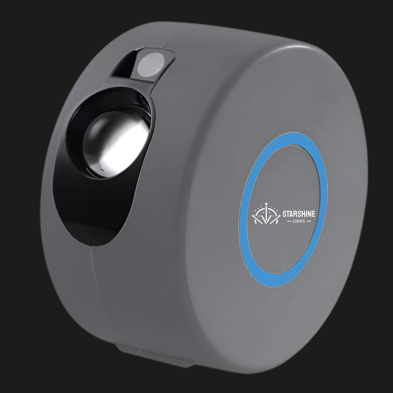 Compact G2 mini LED galaxy projector emitting colorful nebula light and green laser stars indoors. — view 2
