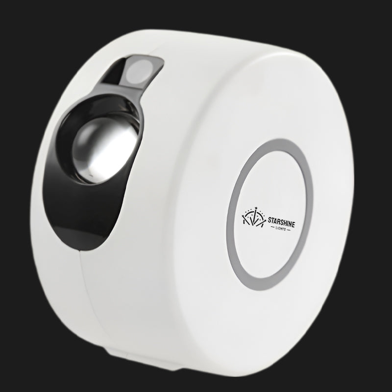 Compact G2 mini LED galaxy projector emitting colorful nebula light and green laser stars indoors. — view 4