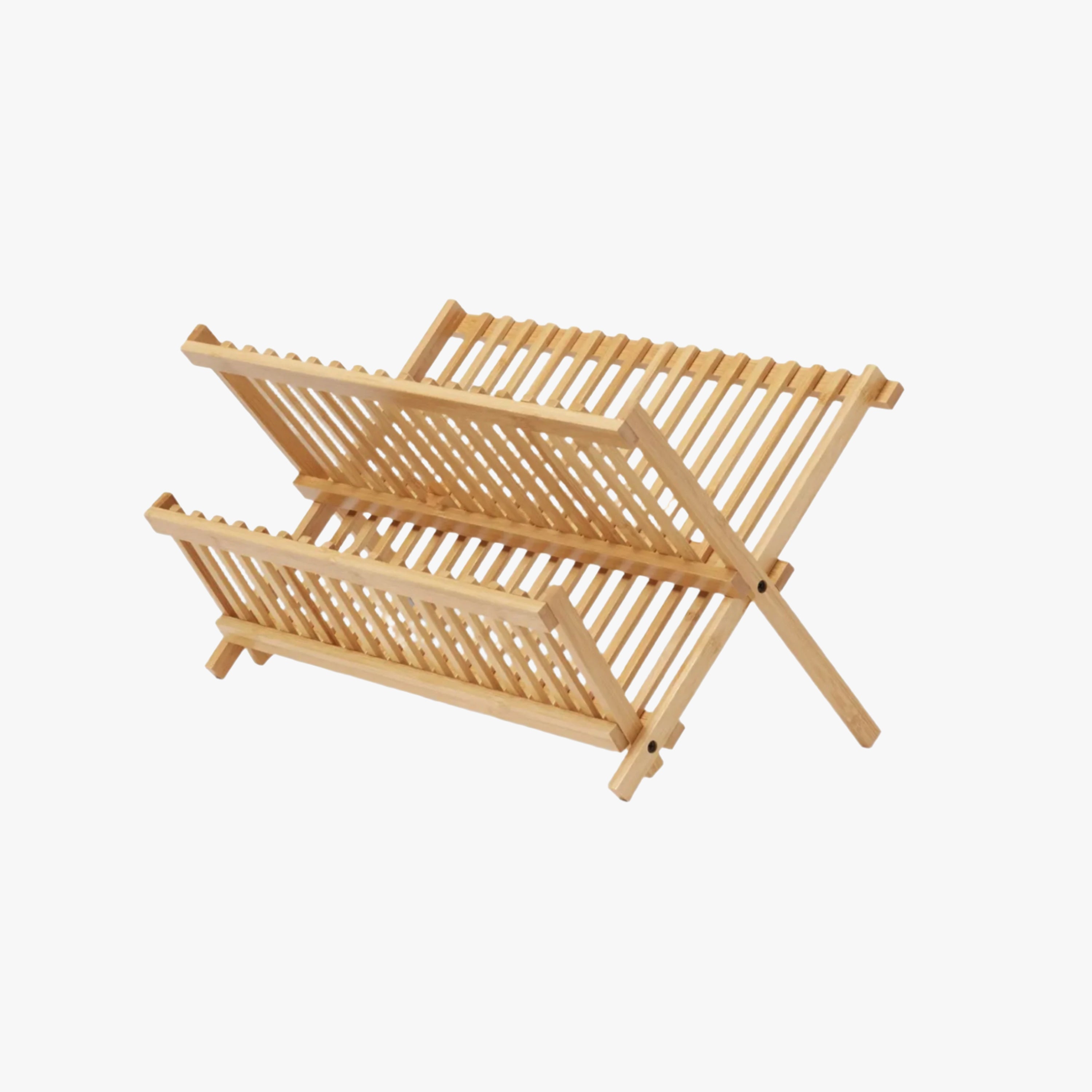 Two-tier foldable natural bamboo dish drying rack organizing plates and cups on a kitchen counter