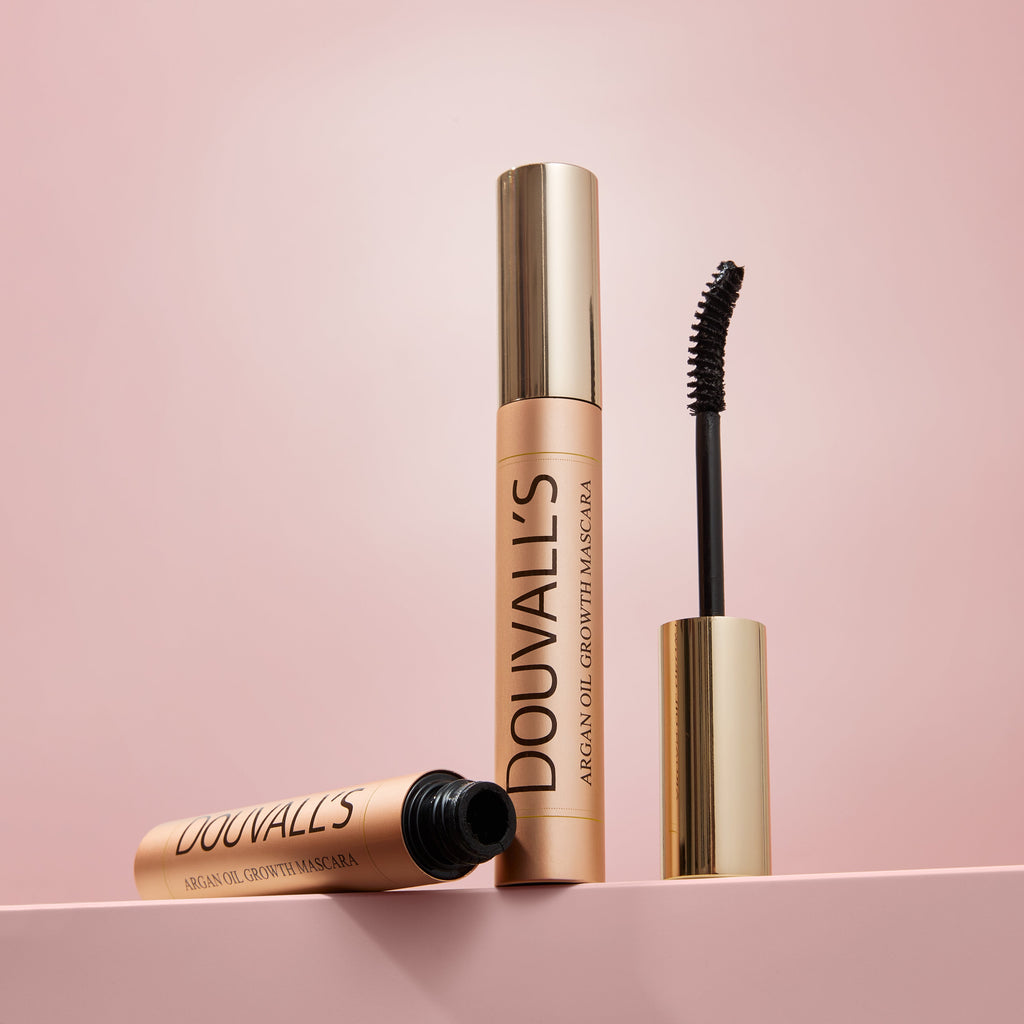 Black Argan Growth Serum Mascara tube with curved applicator brush for volumizing and lifting eyelashes. — view 5