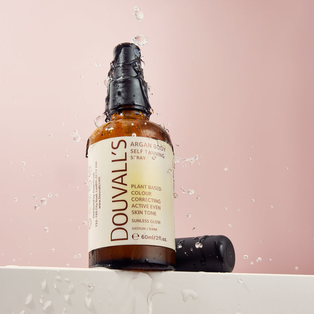 Eco-friendly bottle of Douvalls hydrating Argan self tanning body spray for a natural radiant glow — view 5