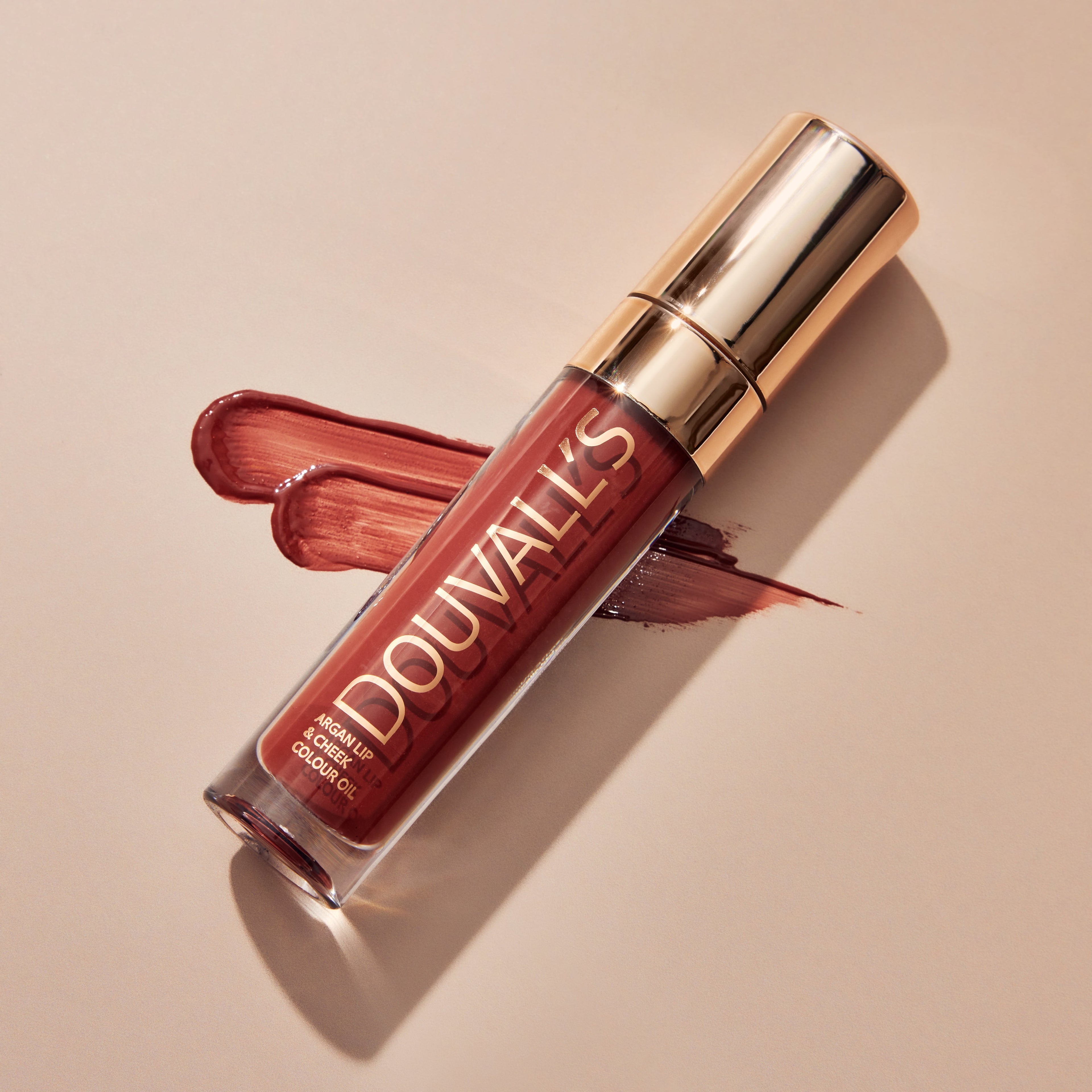 Argan lip and cheek oil rouge noir in small bottle of hydrating cream tint makeup — view 4