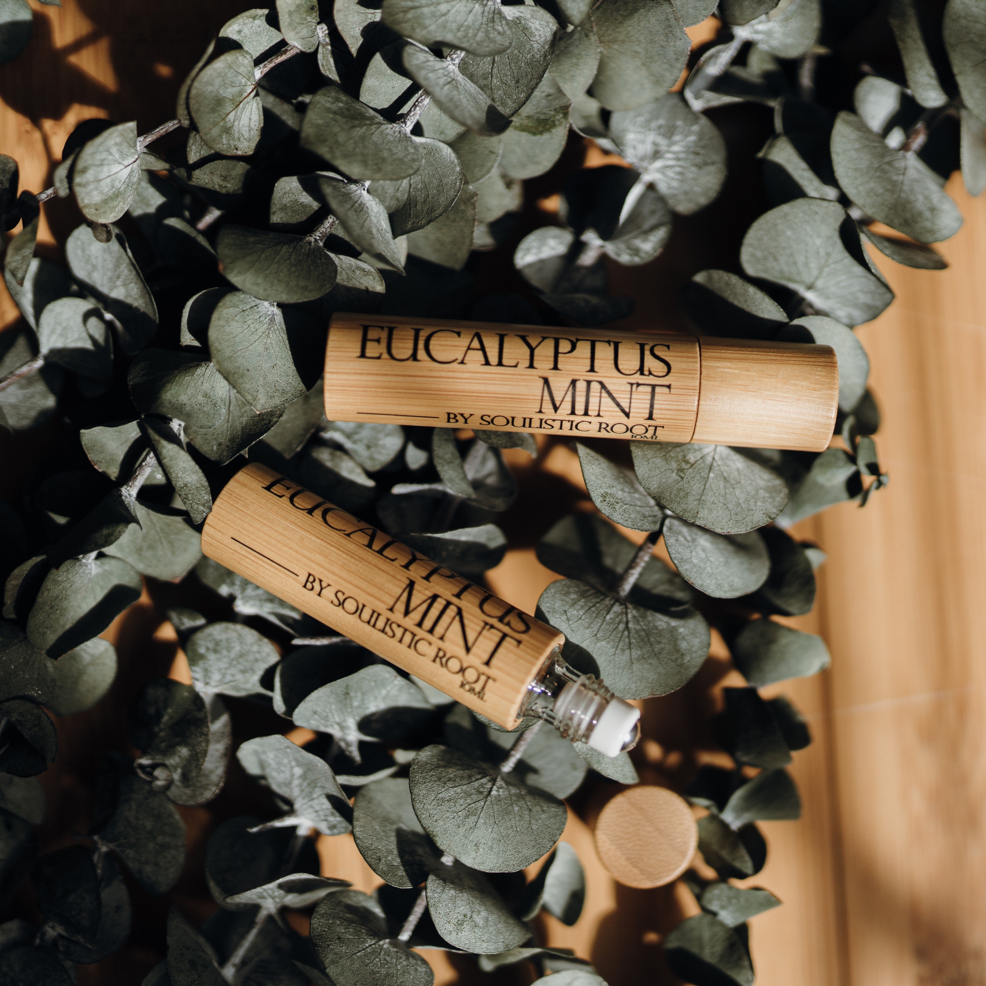 Eucalyptus mint essential oil roller with shatterproof bamboo casing and stainless steel roller ball — view 3