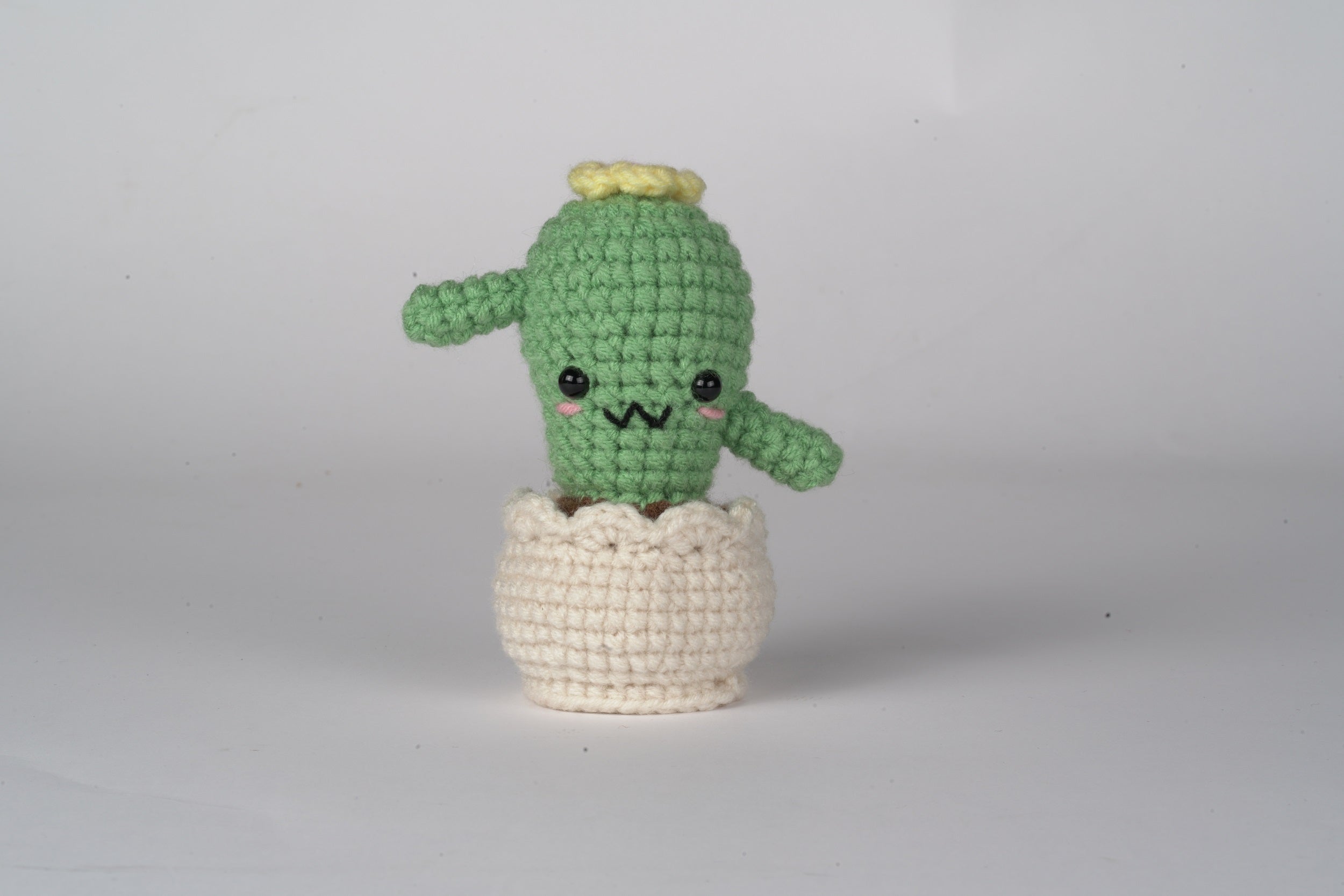 Amigurumi DIY crochet kit with premium yarn, stuffing, hook, and tutorial card in paper bag — view 2