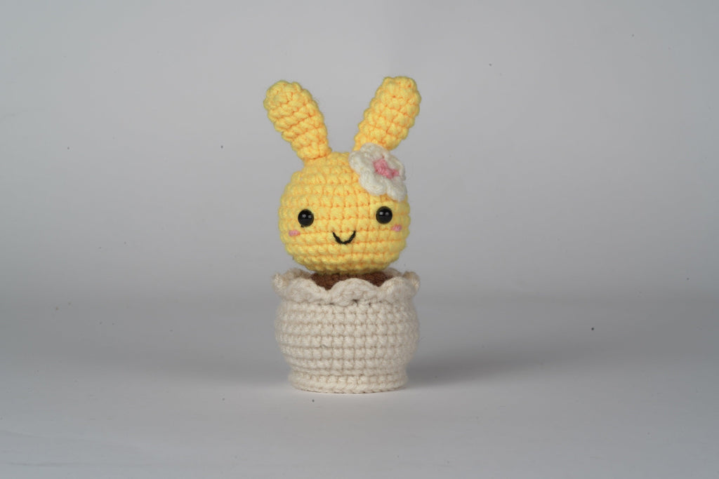 Amigurumi DIY crochet kit with premium yarn, stuffing, hook, and tutorial card in paper bag — view 3
