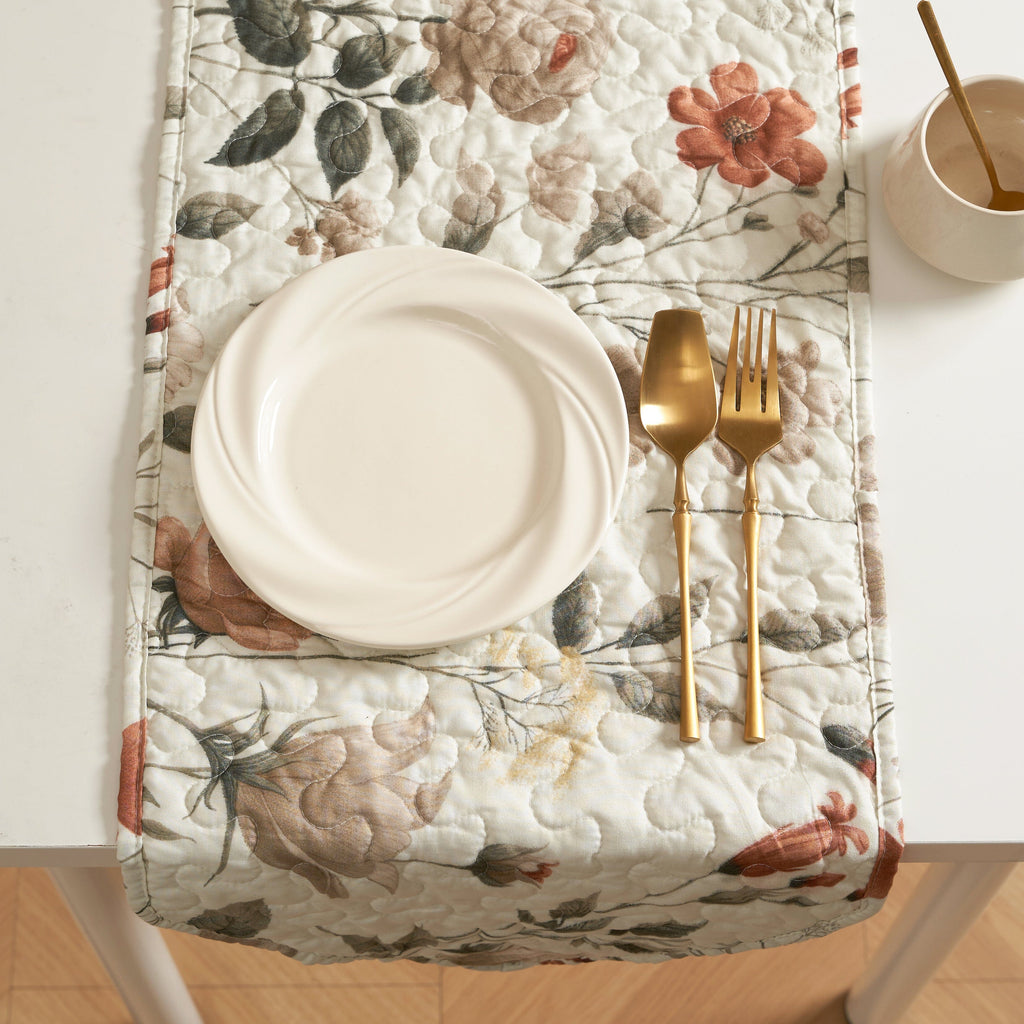 Reversible floral quilted table runner in beige and soft green for dining room tabletop protection — view 4