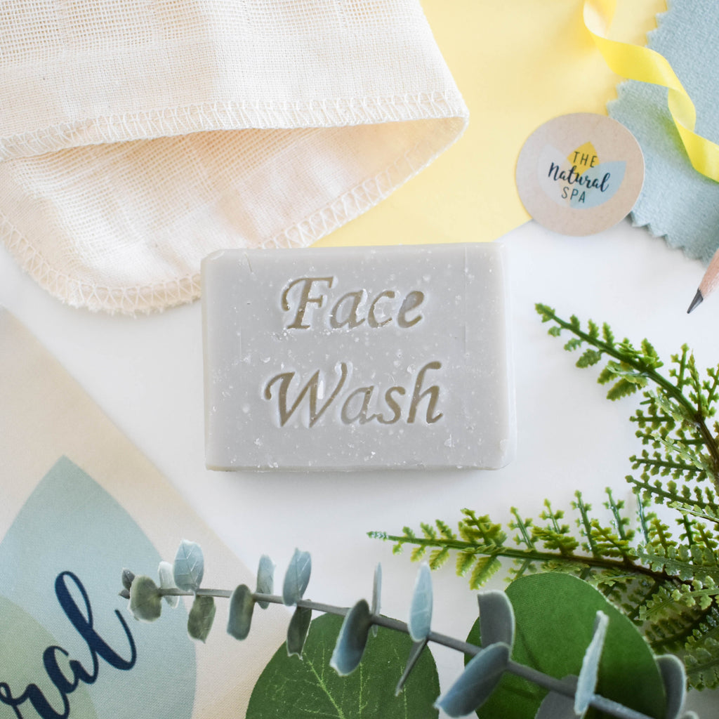 Exfoliating face wash bar with patchouli clary sage and sweet orange for gentle vegan skincare.