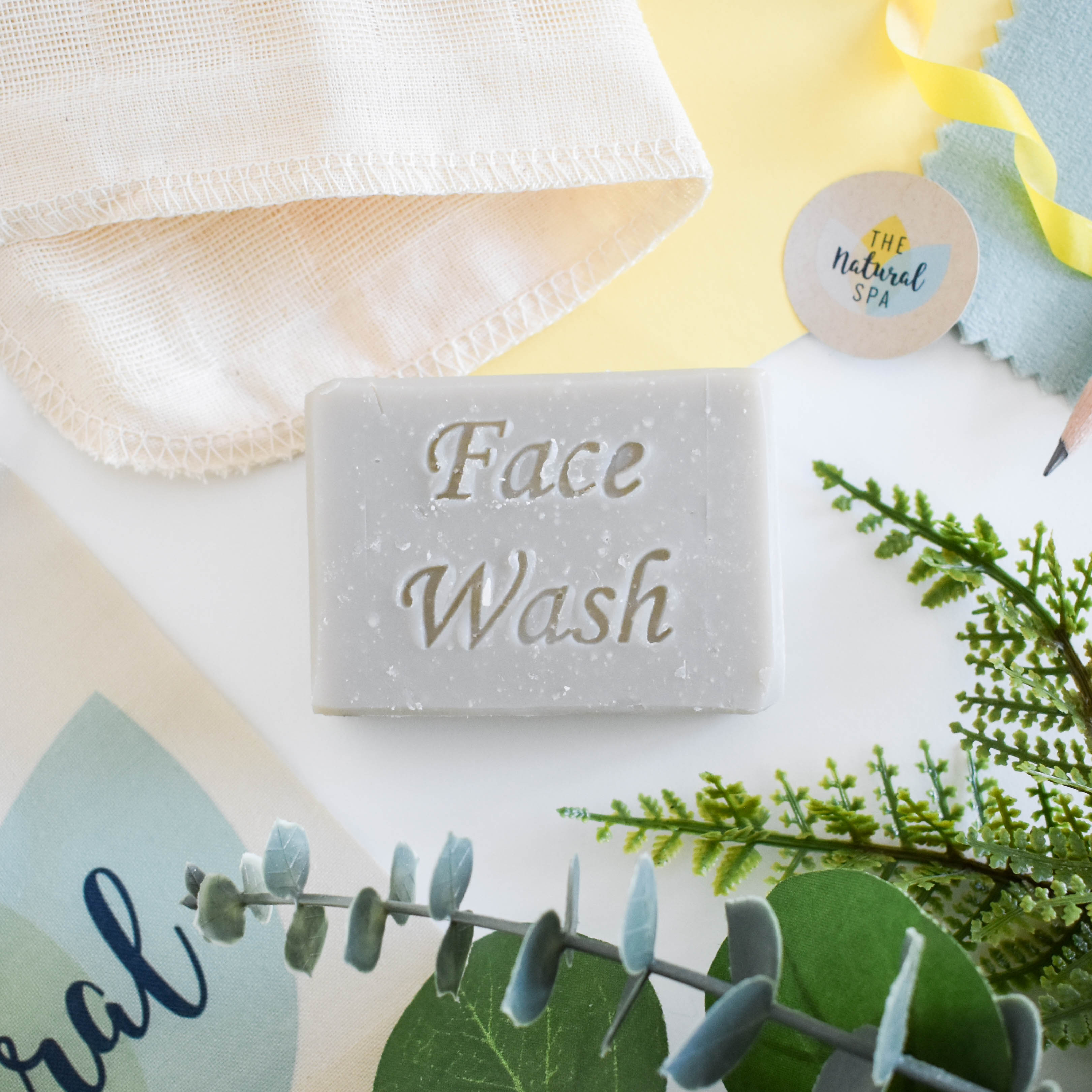 Exfoliating face wash bar with patchouli clary sage and sweet orange for gentle vegan skincare.