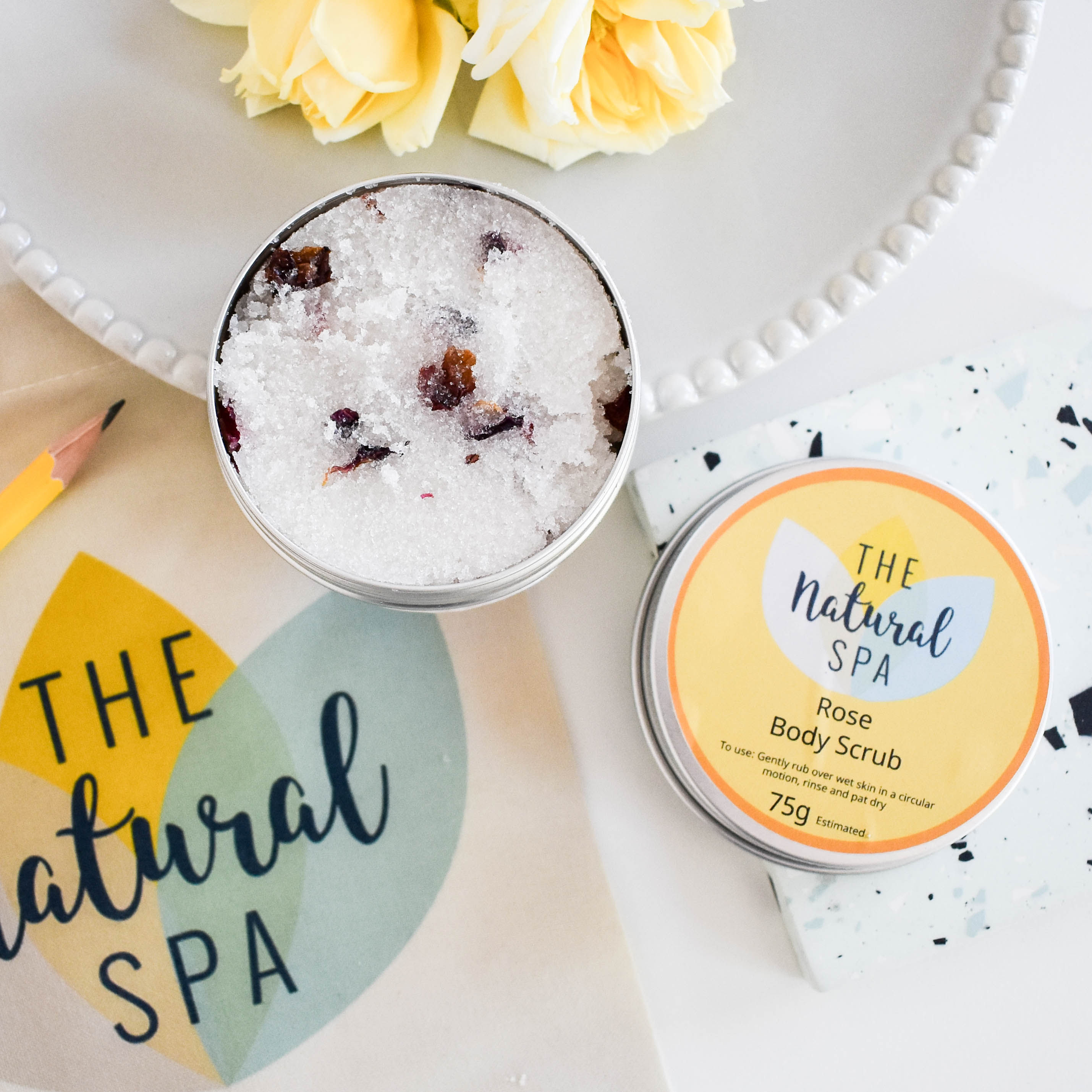 Natural rose sugar body scrub in plastic free packaging with botanical ingredients