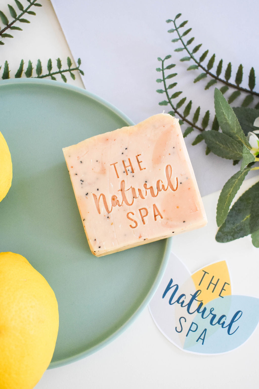 Lemon sorbet handmade natural soap bar with poppy seeds, showcasing a textured yellow botanical finish. — view 3