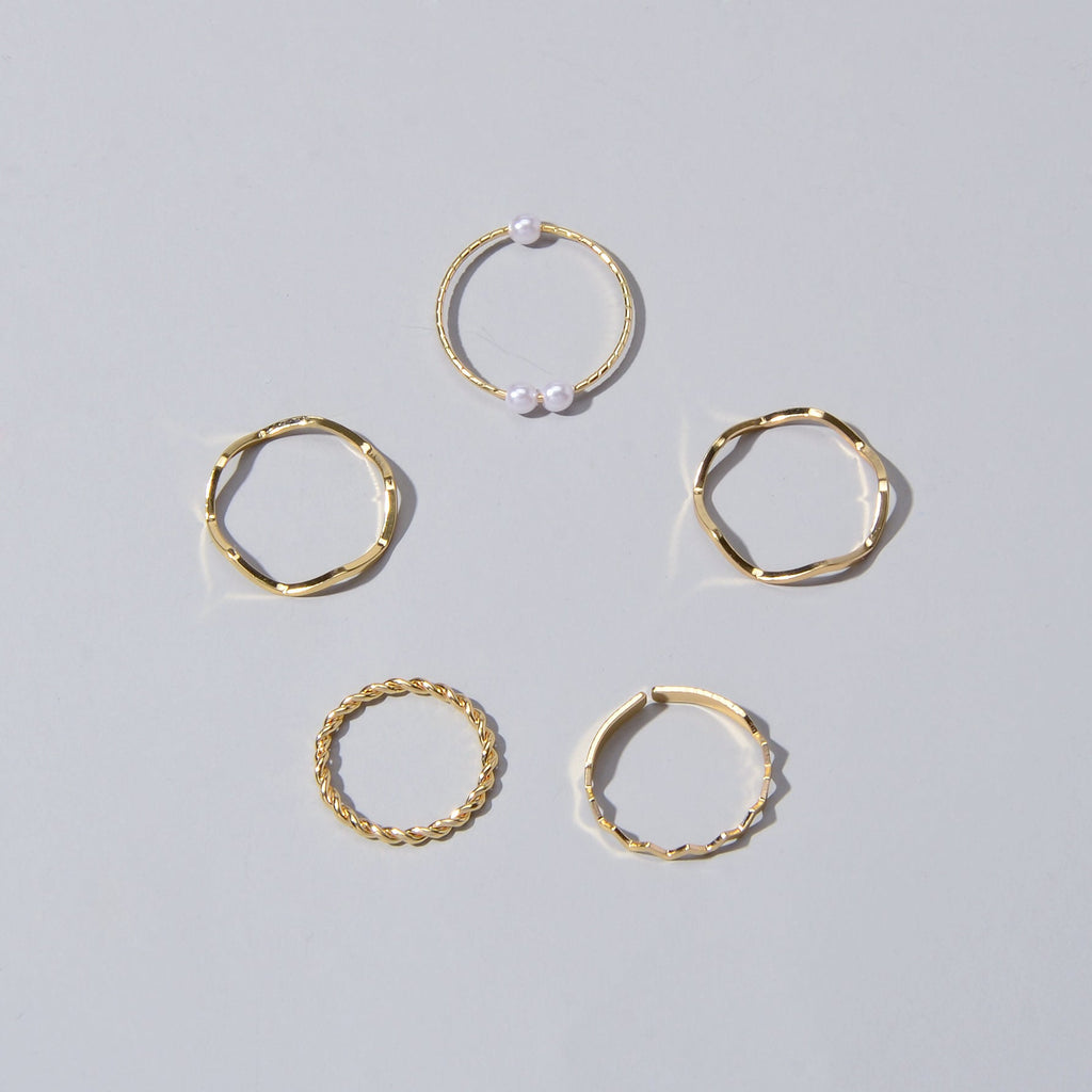 5 piece stackable minimalist finger ring set in metal with elegant pearl accents — view 5