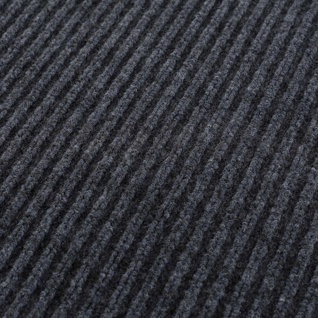 Solid gray outdoor mat with thin low profile design and non-slip rubber backing — view 5