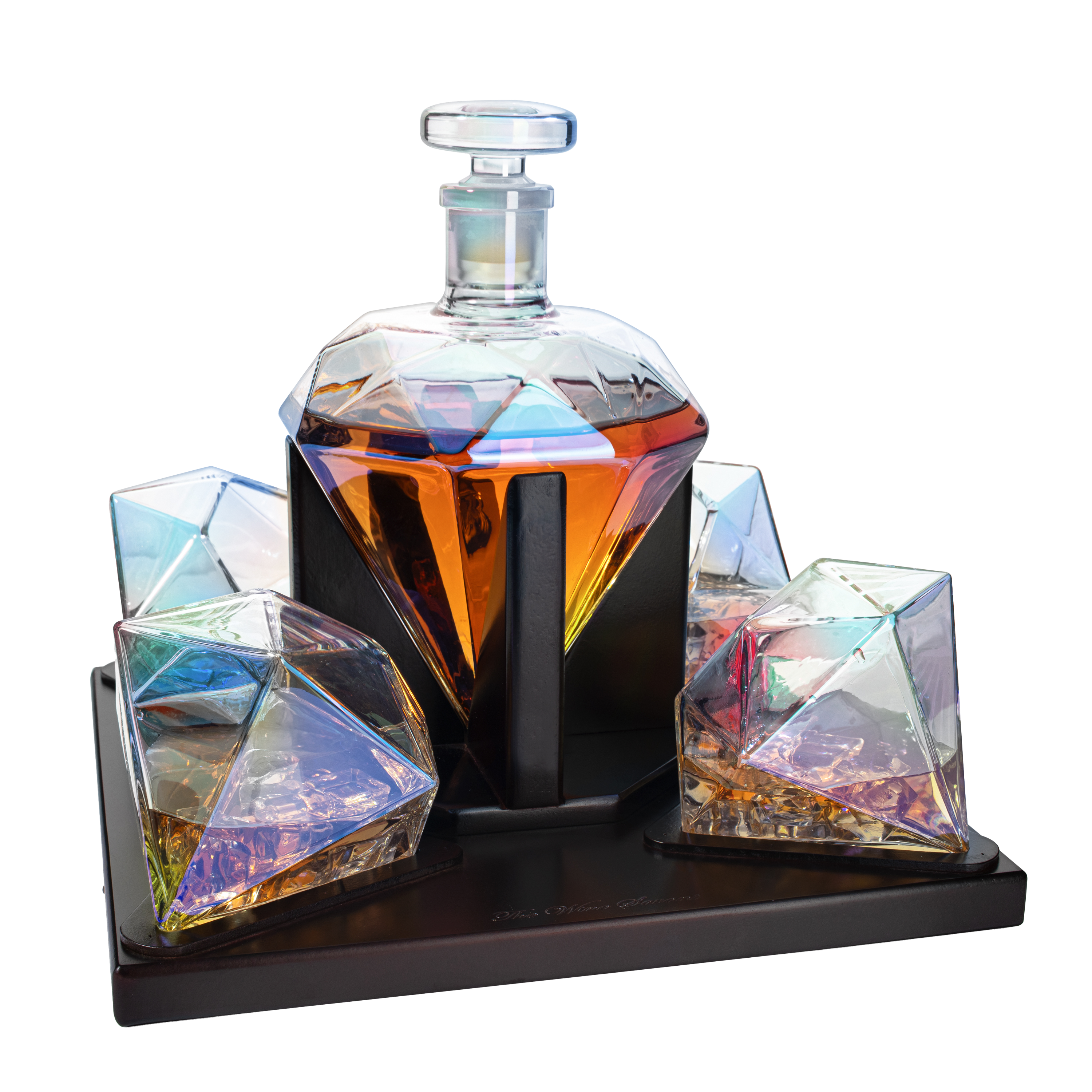 Diamond iridescent whiskey decanter set with two glasses on a mahogany wood stand