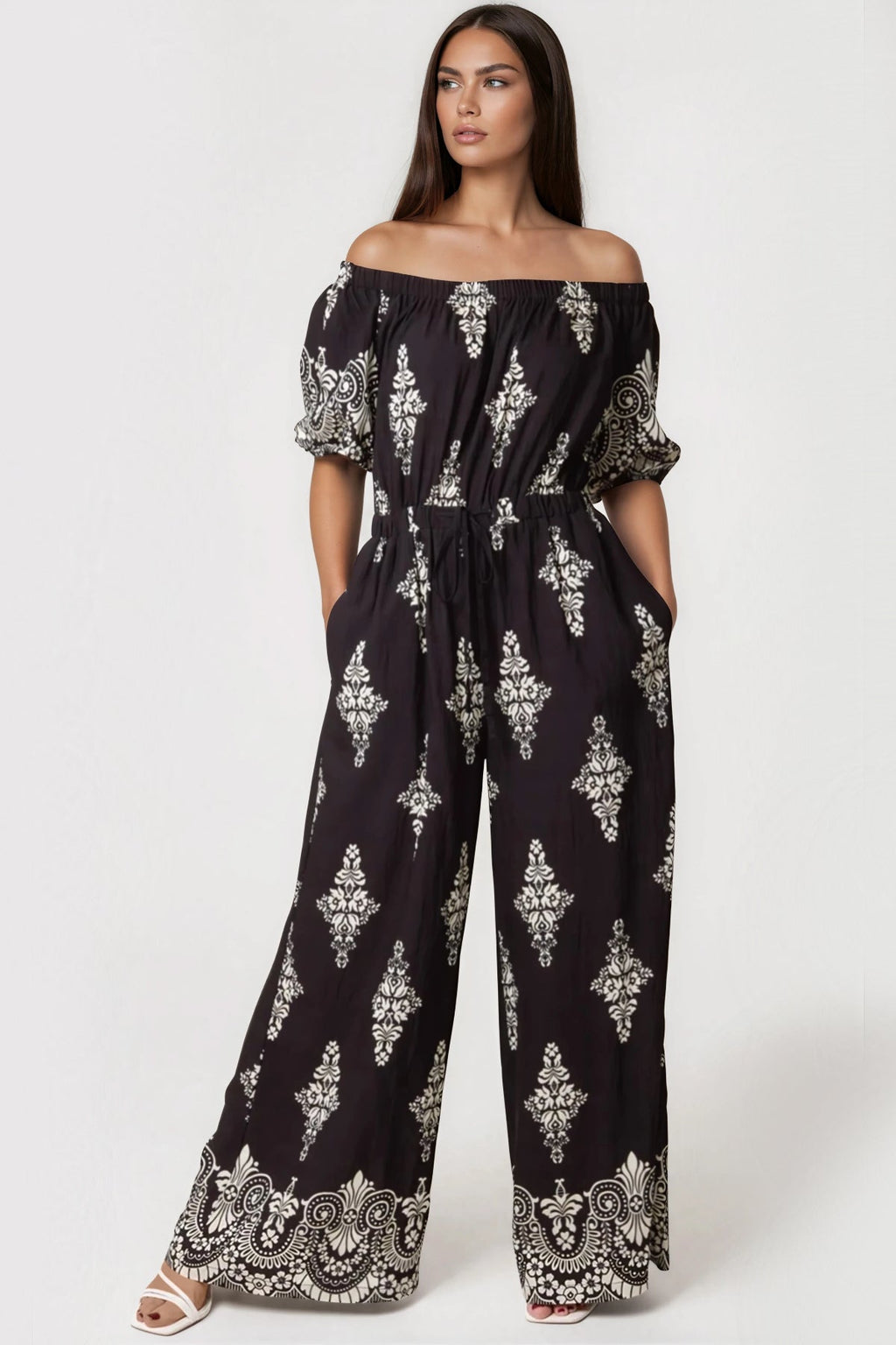 Black Bardot wide leg jumpsuit with damask print, short sleeves, and an elasticated tie waist