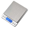 Digital kitchen scale with sleek stainless steel platform, LCD screen, and clear plastic measuring trays