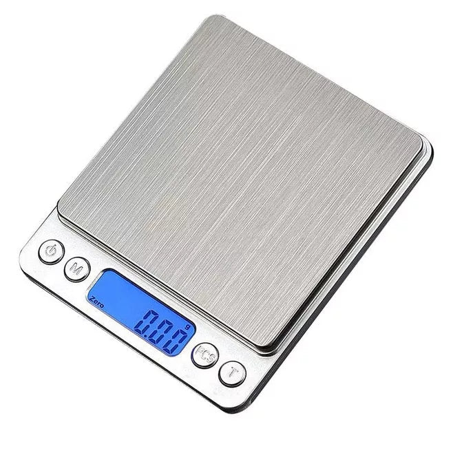 Digital kitchen scale with sleek stainless steel platform, LCD screen, and clear plastic measuring trays