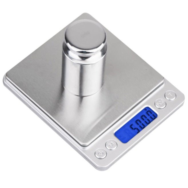 Digital kitchen scale with sleek stainless steel platform, LCD screen, and clear plastic measuring trays — view 2