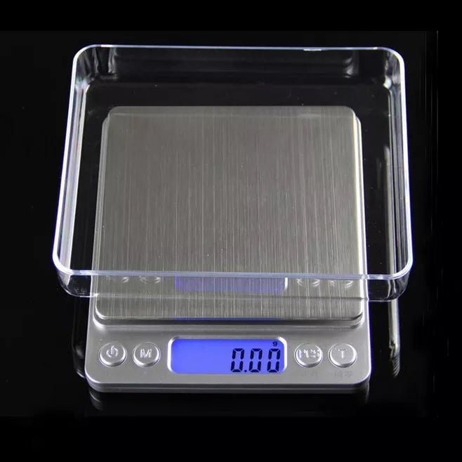 Digital kitchen scale with sleek stainless steel platform, LCD screen, and clear plastic measuring trays — view 3