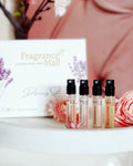 Luxury perfume discovery set in premium travel box, four small glass fragrance vials for women