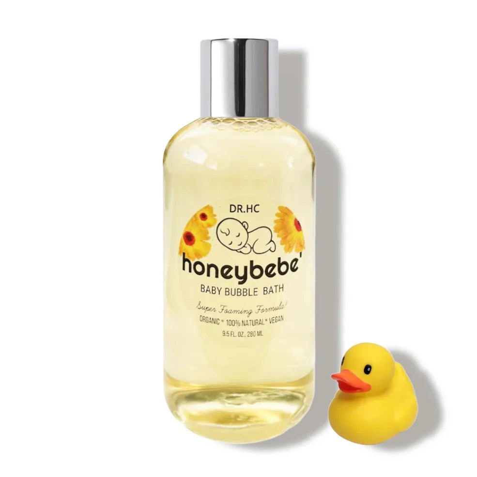 Organic baby bubble bath bottle with cap featuring natural soothing patchouli ingredients.