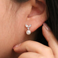 Cubic leaf pearl drop earrings with sparkling zirconia stones and sterling silver posts