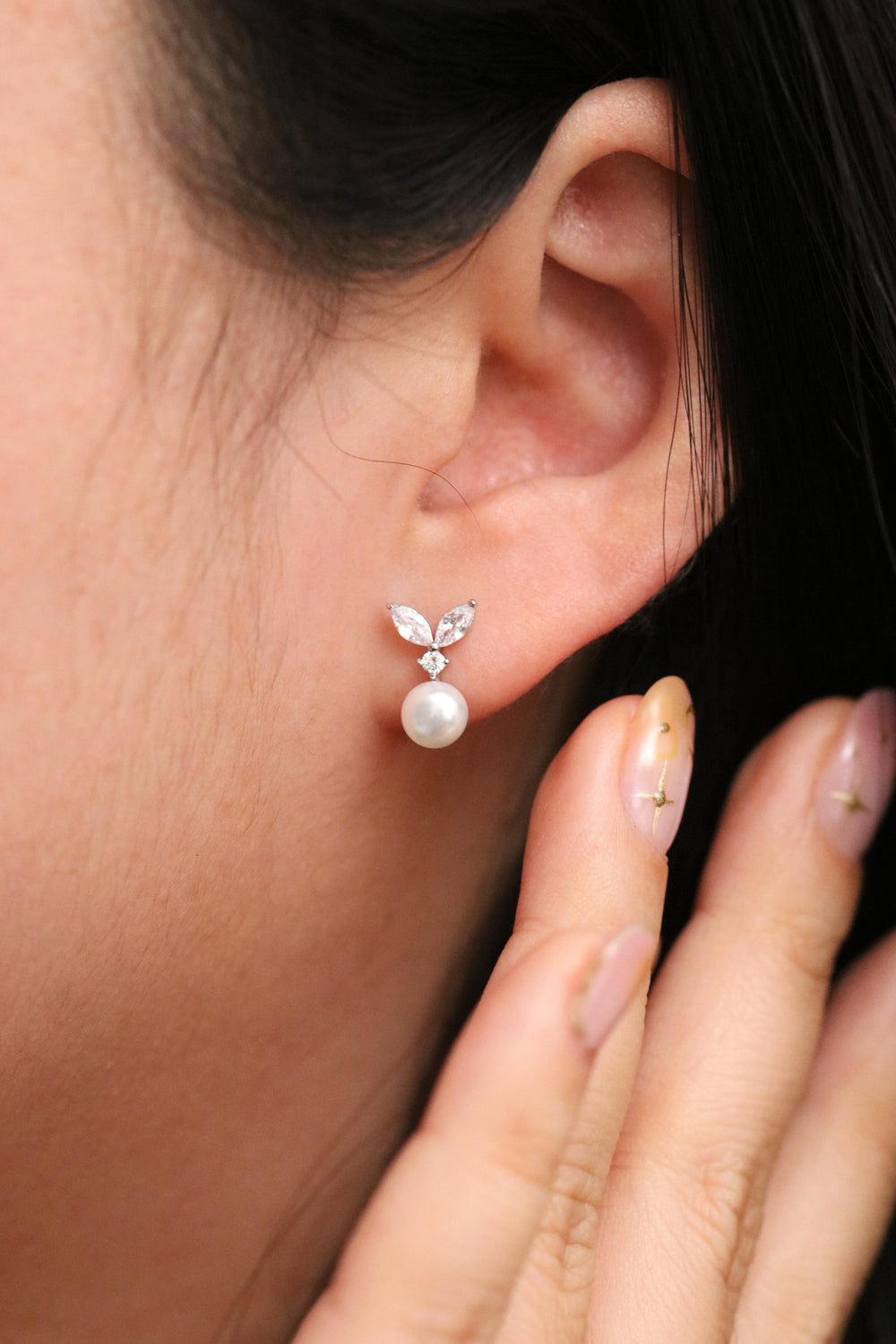 Cubic leaf pearl drop earrings with sparkling zirconia stones and sterling silver posts — view 3