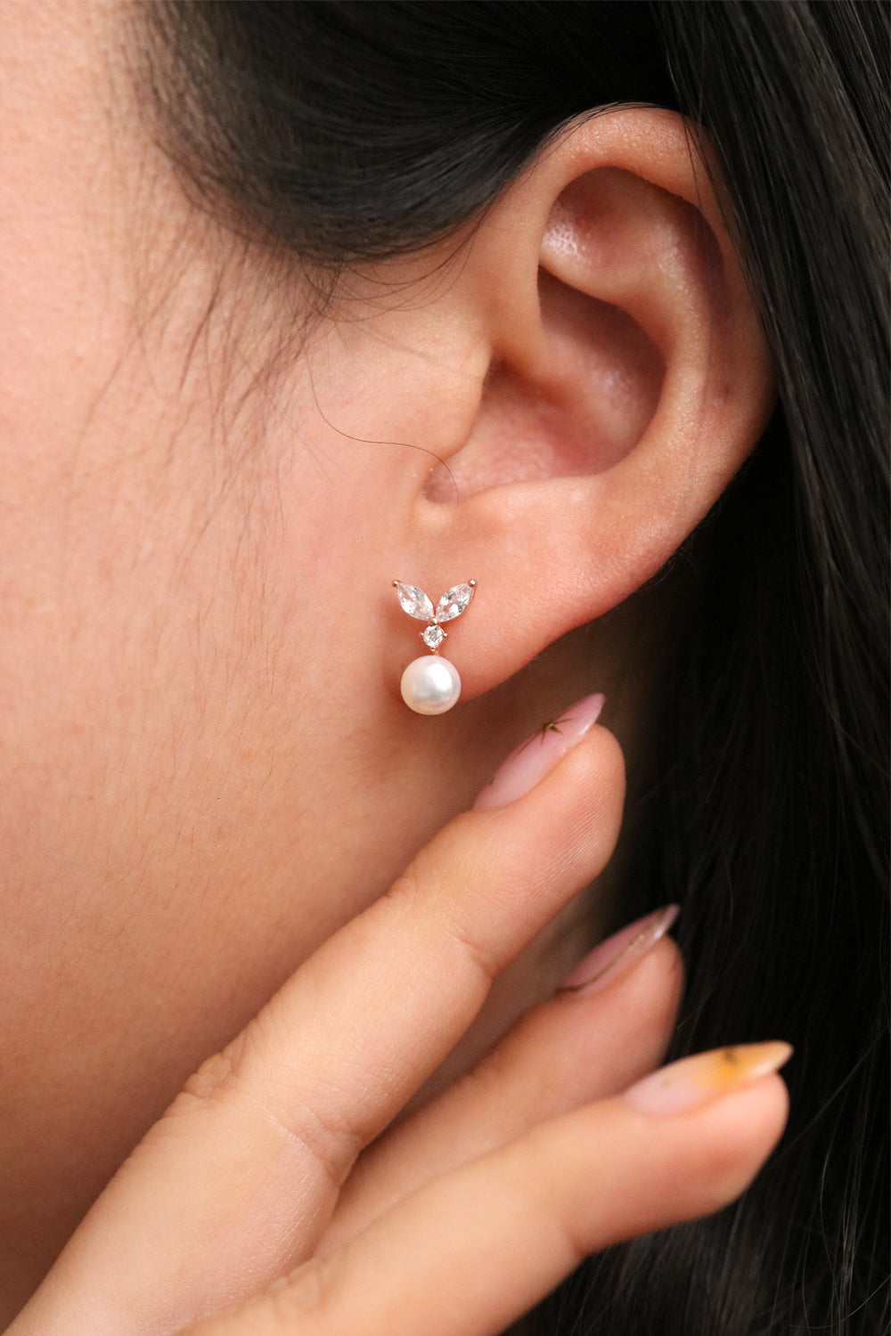 Cubic leaf pearl drop earrings with sparkling zirconia stones and sterling silver posts — view 4