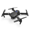 Black E88 foldable quadcopter drone with 4K dual camera and remote control transmitter