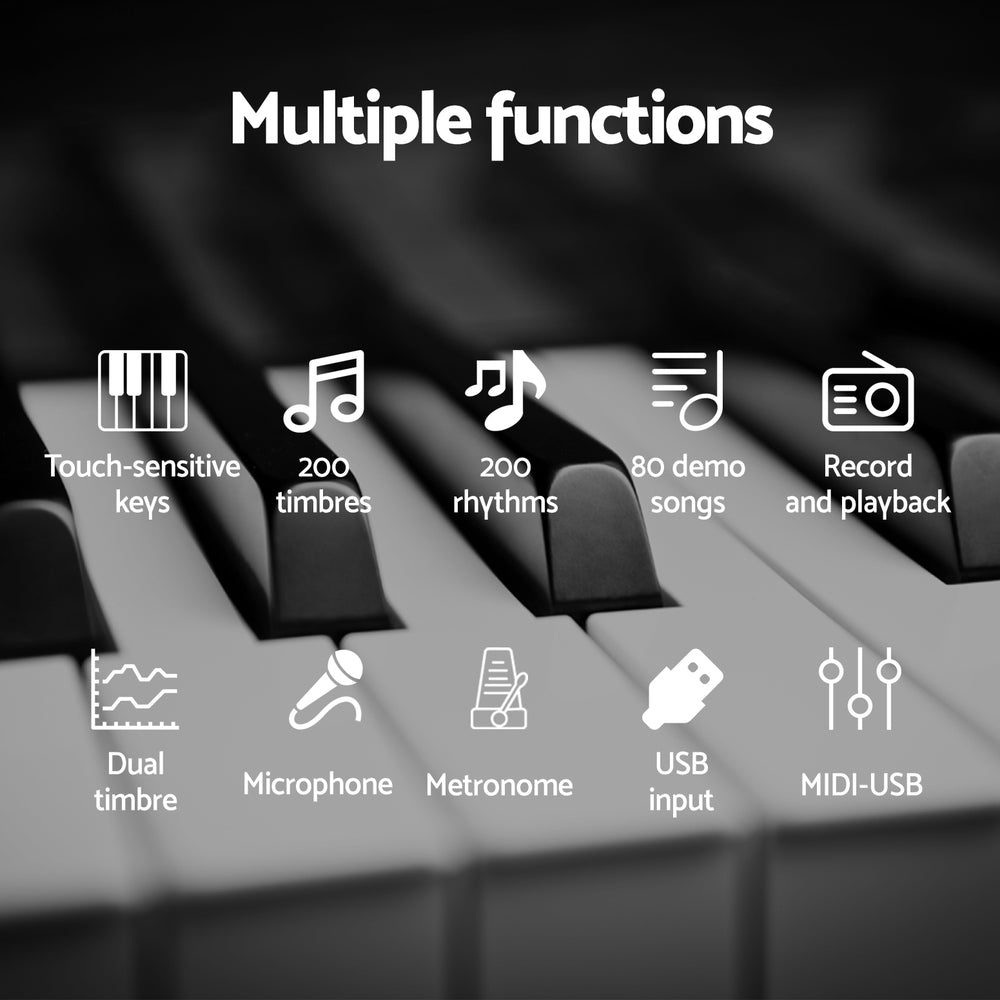 Black 61-key foldable electronic piano keyboard with travel bag, microphone, and sustain pedal — view 5