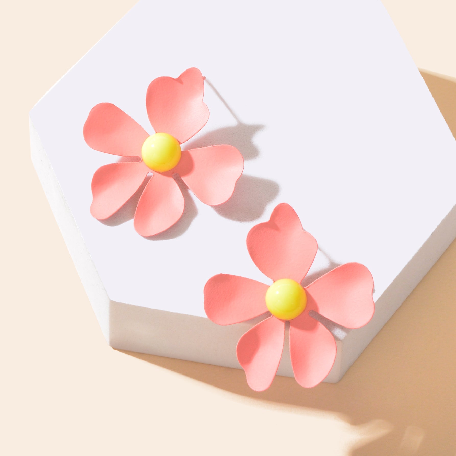 Blue and pink flower stud earrings with intricate petal details on a white background — view 3