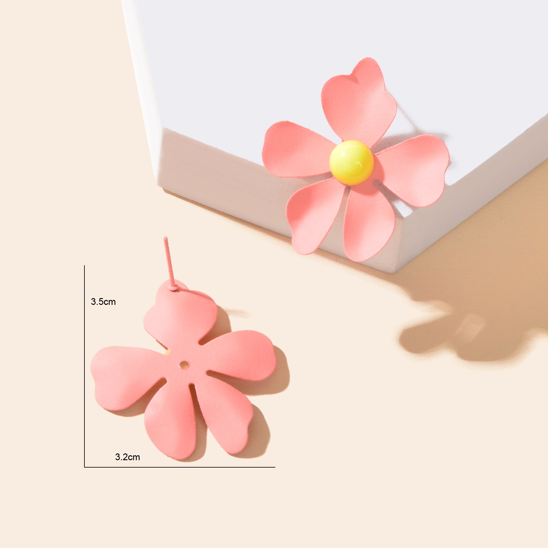 Blue and pink flower stud earrings with intricate petal details on a white background — view 5