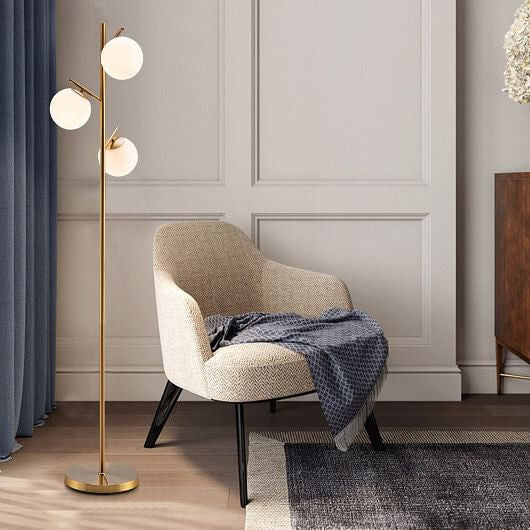 Golden 3-globe floor lamp with frosted glass shades, steel pole, and sturdy weighted base