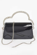 Glitter evening bag with structured silhouette and sparkling rhinestone top handle for formal events