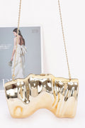 Clear transparent acrylic evening case bag with polished metallic accents and secure clasp closure