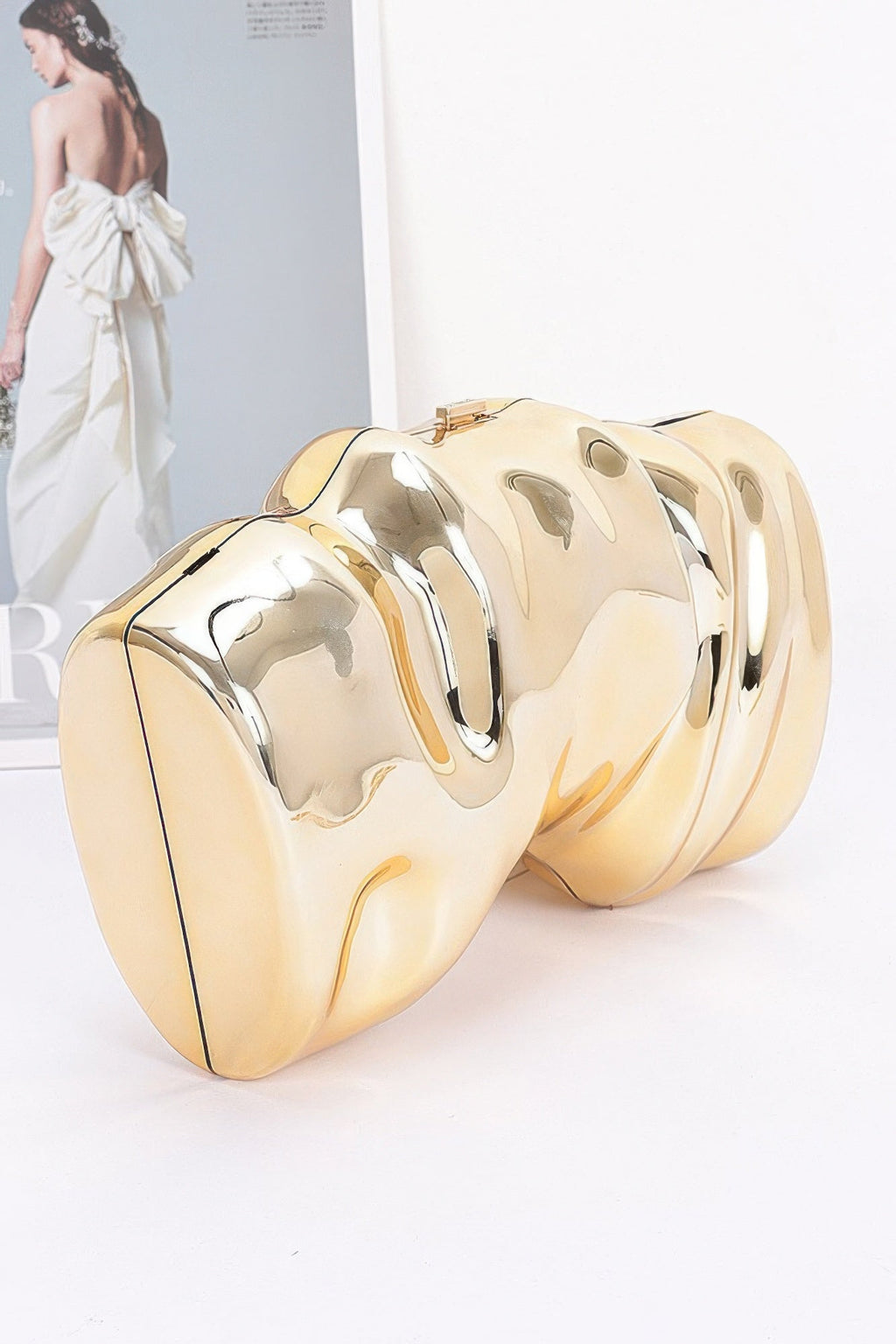 Clear transparent acrylic evening case bag with polished metallic accents and secure clasp closure — view 2