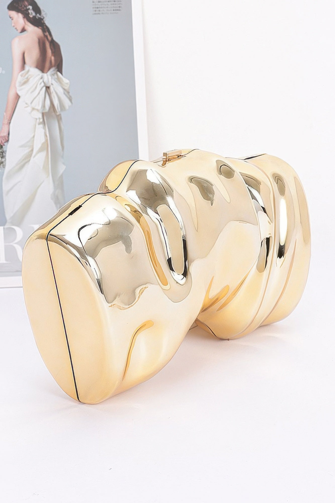 Clear transparent acrylic evening case bag with polished metallic accents and secure clasp closure — view 2