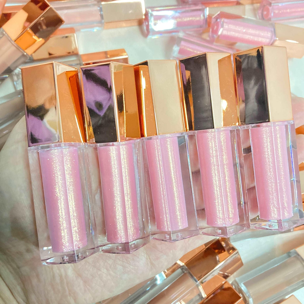 Eco-friendly vegan lip gloss in a sleek clear tube featuring vibrant high-shine moisturizing color — view 2