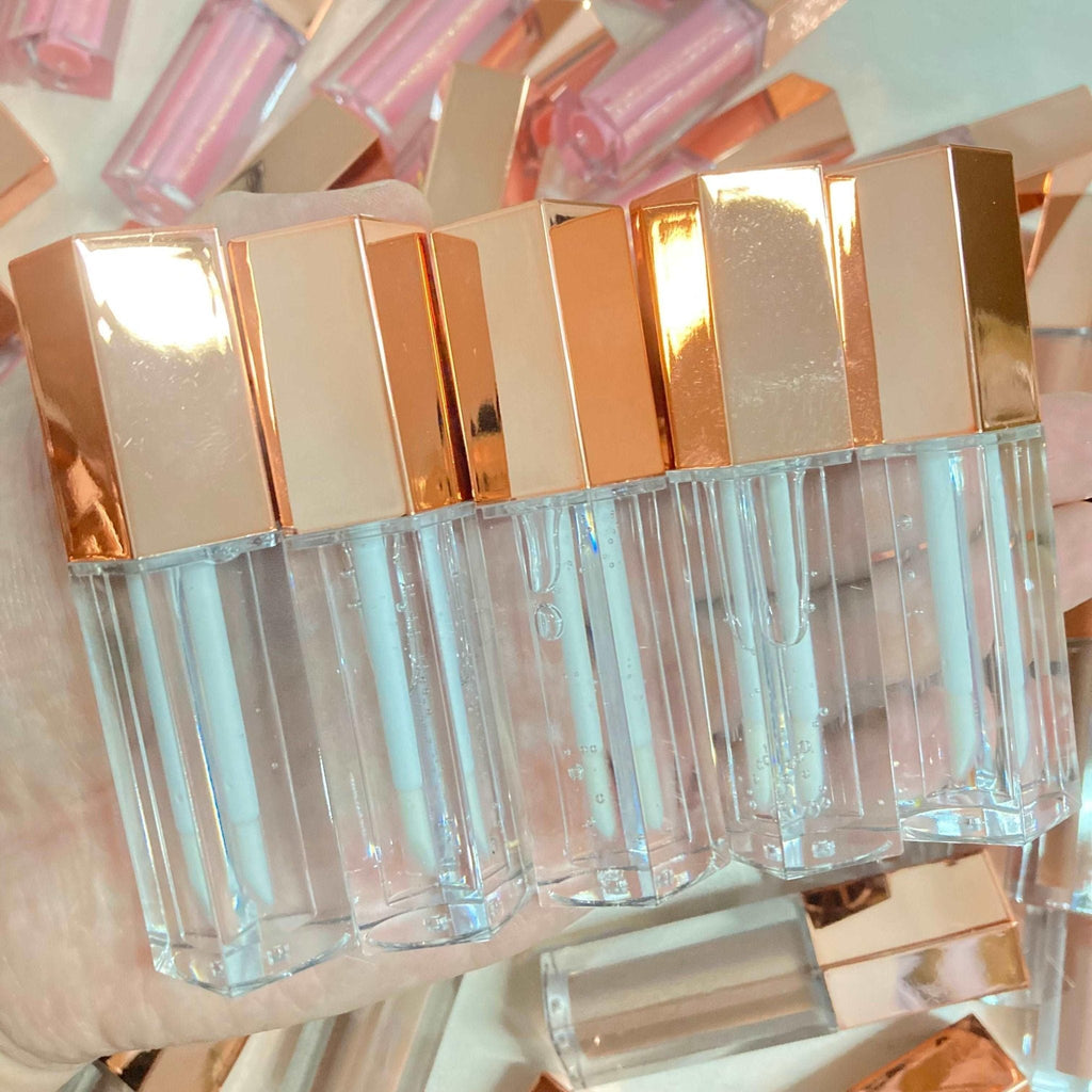 Eco-friendly vegan lip gloss in a sleek clear tube featuring vibrant high-shine moisturizing color — view 3