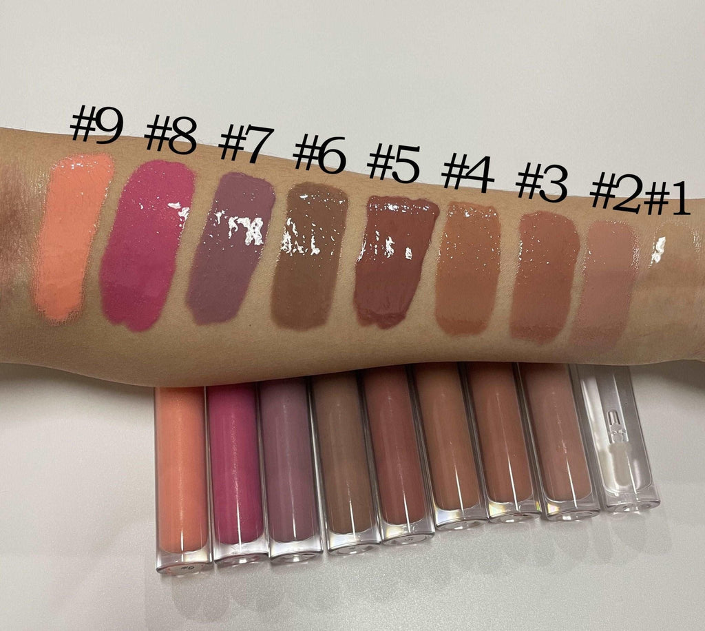 Eco-friendly vegan lip gloss in a sleek clear tube featuring vibrant high-shine moisturizing color — view 4