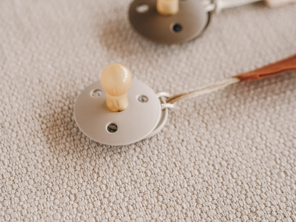 Soft silicone baby pacifier with fabric holder clip in natural earth tones for infants. — view 5