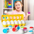 Green plastic egg shape matching educational toy for toddlers in a durable storage case