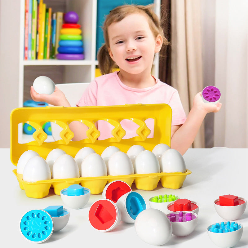 Green plastic egg shape matching educational toy for toddlers in a durable storage case