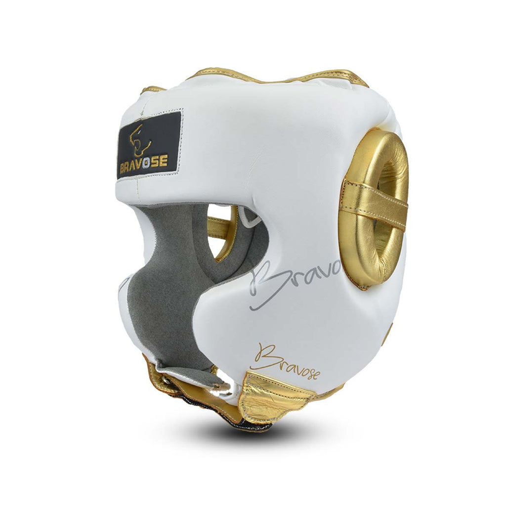 Elite boxing head guard in white PU leather with gold details and adjustable strap — view 2