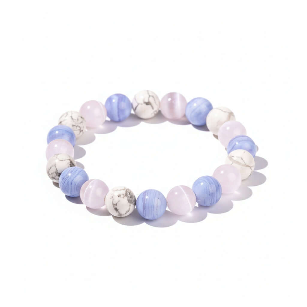 Handcrafted empath protection beaded bracelet featuring sky blue agate, white howlite, and selenite natural stones.