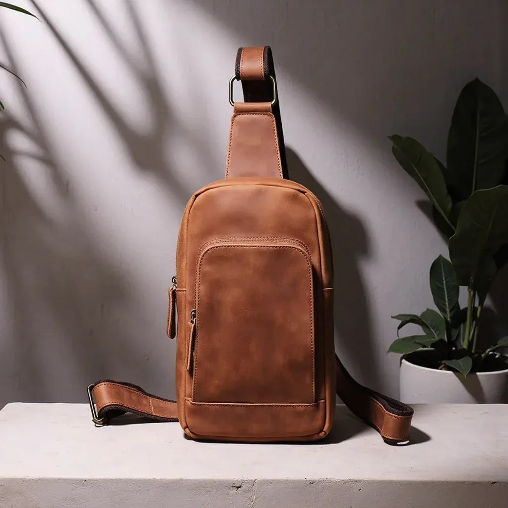 Erling leather sling bag in premium full-grain brown leather with an adjustable crossbody strap. — view 4