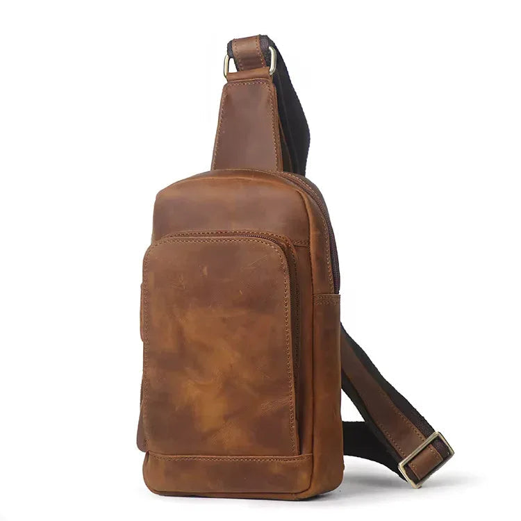Erling leather sling bag in premium full-grain brown leather with an adjustable crossbody strap. — view 2